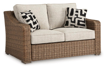 Loveseat de exterior Beachcroft con cojín