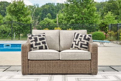 Loveseat de exterior Beachcroft con cojín